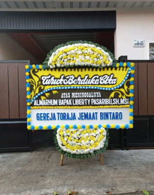 Papan Bunga Duka di Giritirto